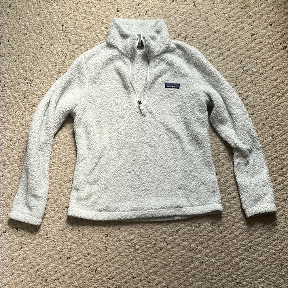 Women’s Patagonia white fleece.